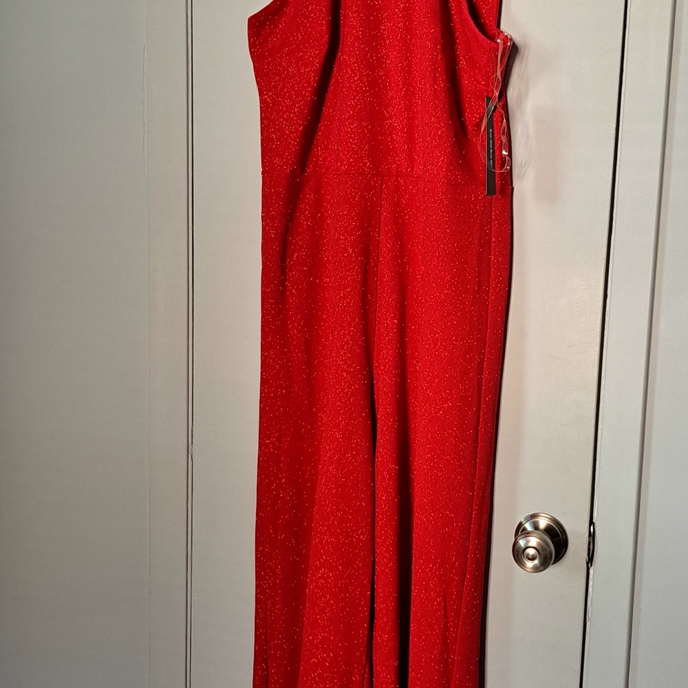 NWT. Size 10 Bebe halter neck Jumpsuit.